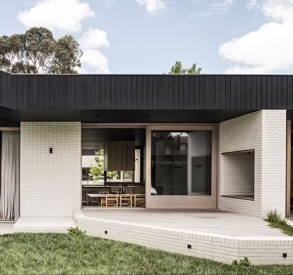 house-with-black-roof-white-porch